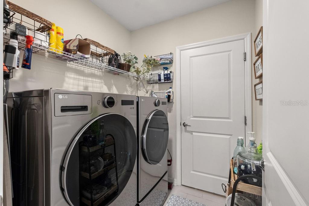 2821 Muller Oak Loop Ocoee, FL 34761 - Photo 17 of 45 a utility room with dryer and washer