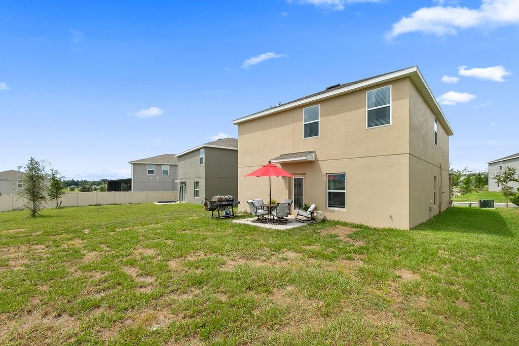 2821 Muller Oak Loop Ocoee, FL 34761 - Photo 36 of 45 a view of a house with backyard