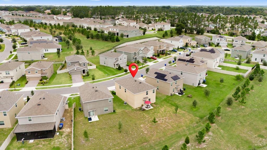 2821 Muller Oak Loop Ocoee, FL 34761 - Photo 38 of 45 an aerial view of residential houses with outdoor space
