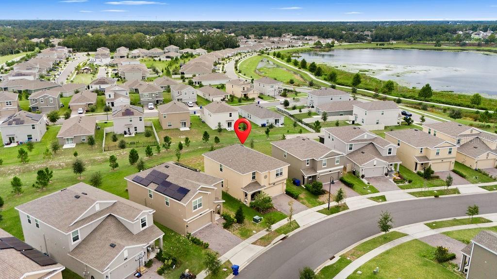 2821 Muller Oak Loop Ocoee, FL 34761 - Photo 41 of 45 an aerial view of a house with a lake view