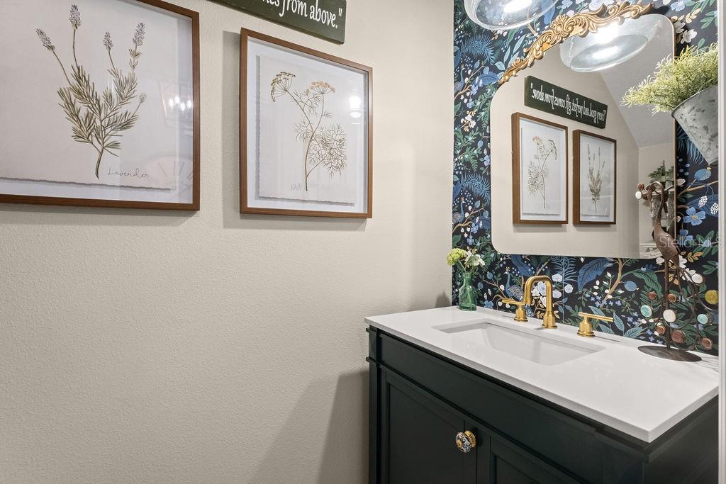 2821 Muller Oak Loop Ocoee, FL 34761 - Photo 8 of 45 a bathroom with a sink and a mirror