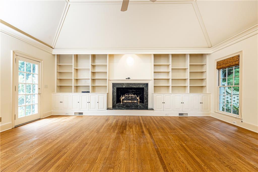 3384 Rilman Road Northwest Atlanta, GA 30327 - Photo 29 of 68 a view of an empty room with a window and fireplace