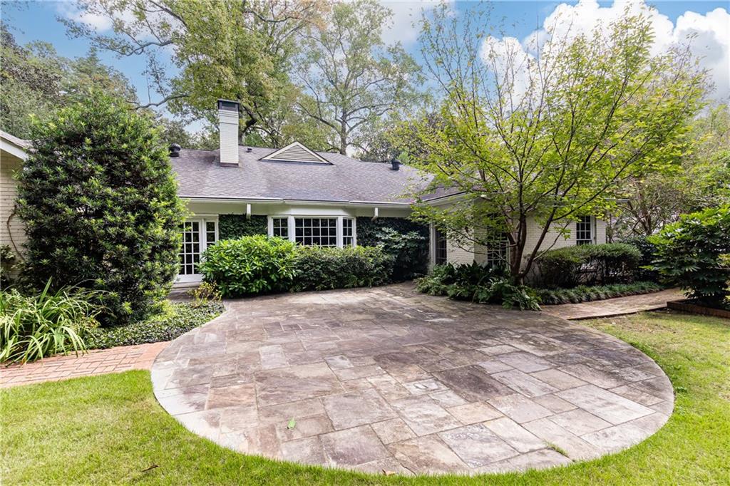 3384 Rilman Road Northwest Atlanta, GA 30327 - Photo 66 of 68 a view of a house with a backyard