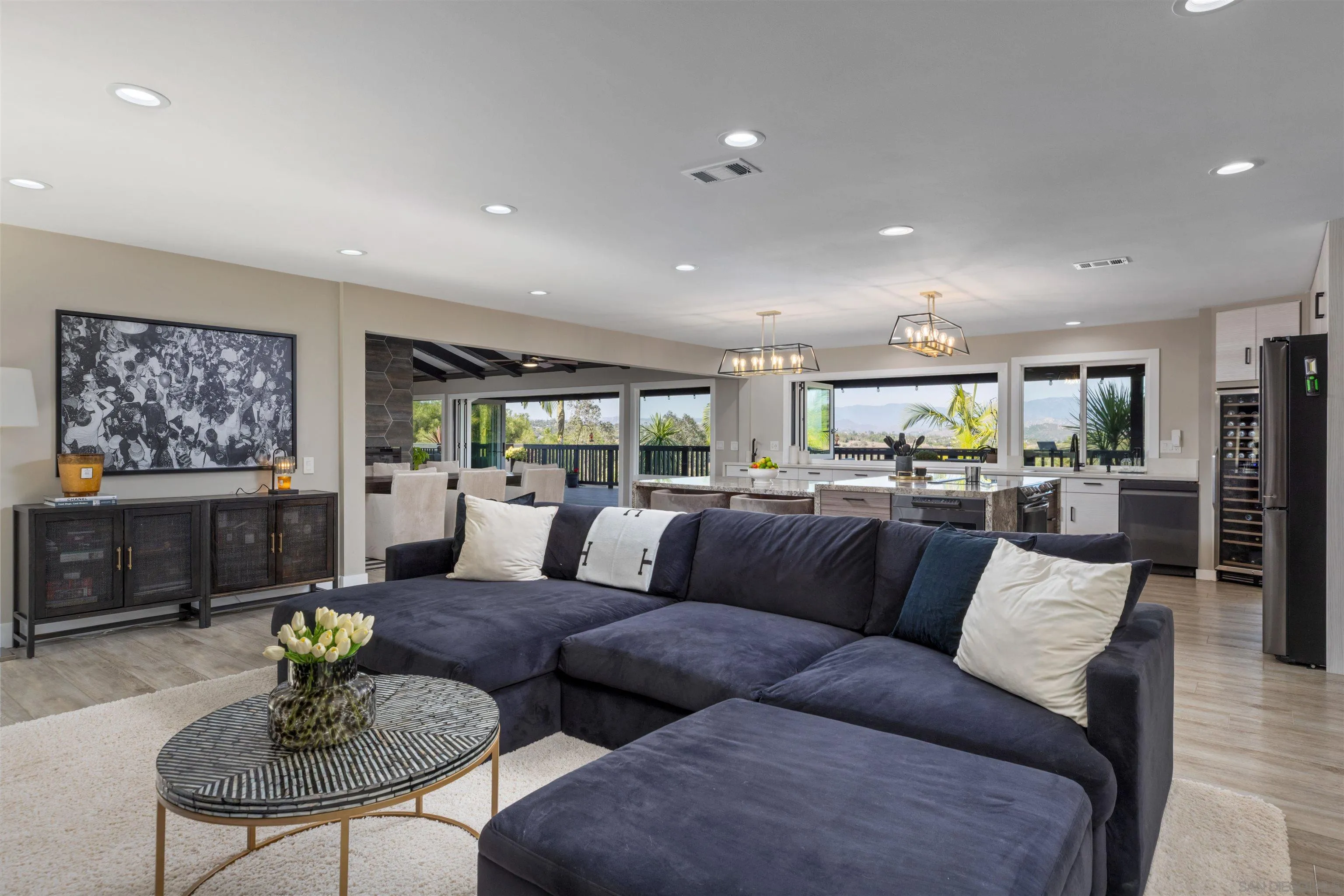 521 Rancho Camino Fallbrook, CA 92028 - Photo 18 of 72 a living room with furniture kitchen view and a table