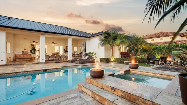 a view of a swimming pool and lounge chair