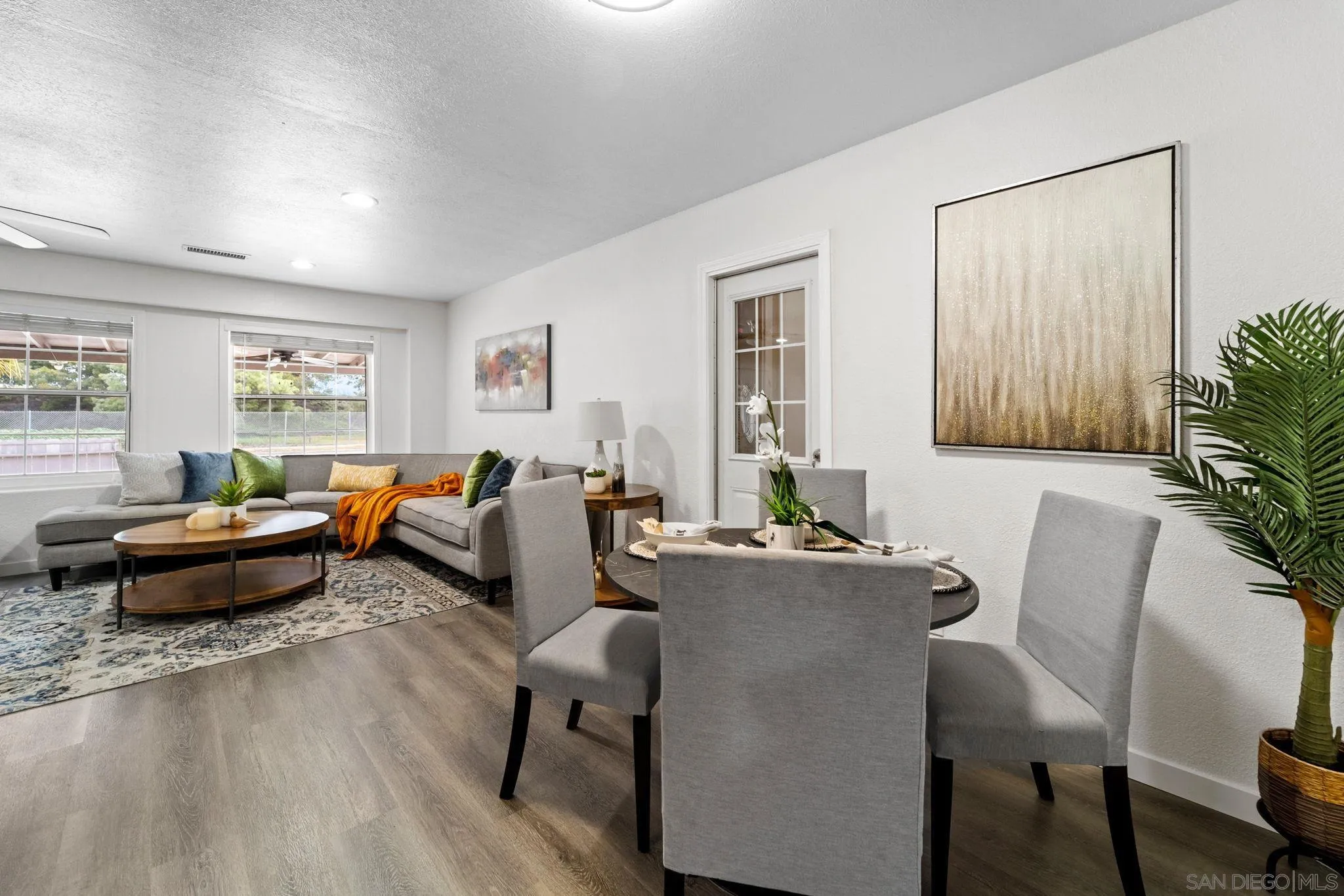 564 Broadview Street Spring Valley, CA 91977 - Photo 13 of 53 a living room with furniture and wooden floor