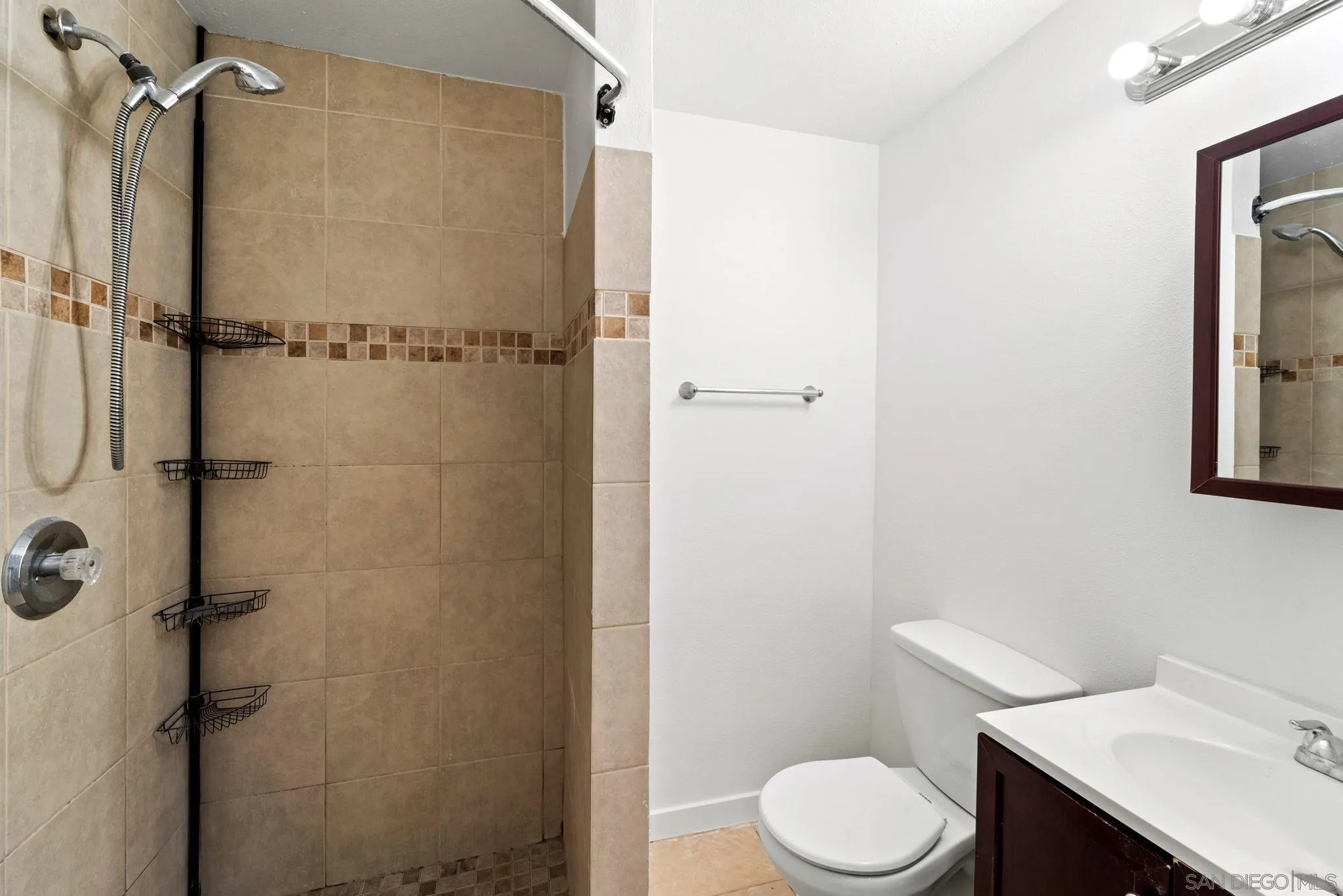 564 Broadview Street Spring Valley, CA 91977 - Photo 35 of 53 a white toilet sitting next to a bathroom sink