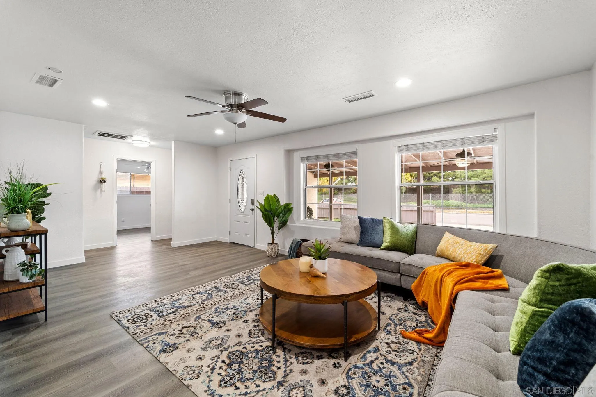 564 Broadview Street Spring Valley, CA 91977 - Photo 6 of 53 a living room with furniture and a potted plant