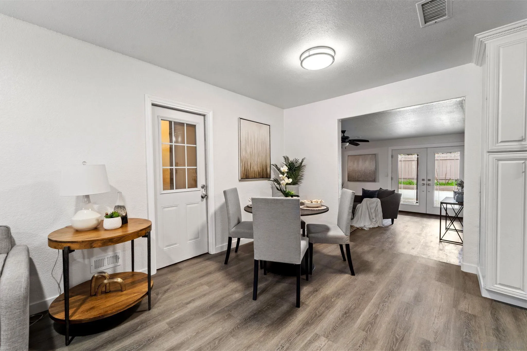 564 Broadview Street Spring Valley, CA 91977 - Photo 7 of 53 a living room with furniture a wooden floor and a sink