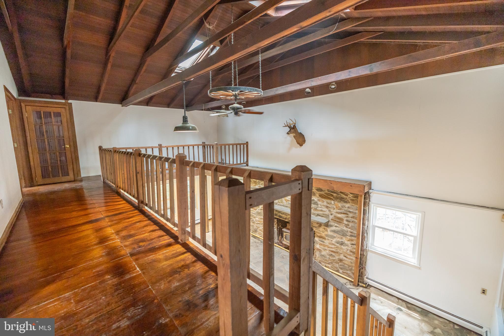 160 Stoney Bank Road Glen Mills, PA 19342 - Photo 18 of 46 a view of a hallway with stairs