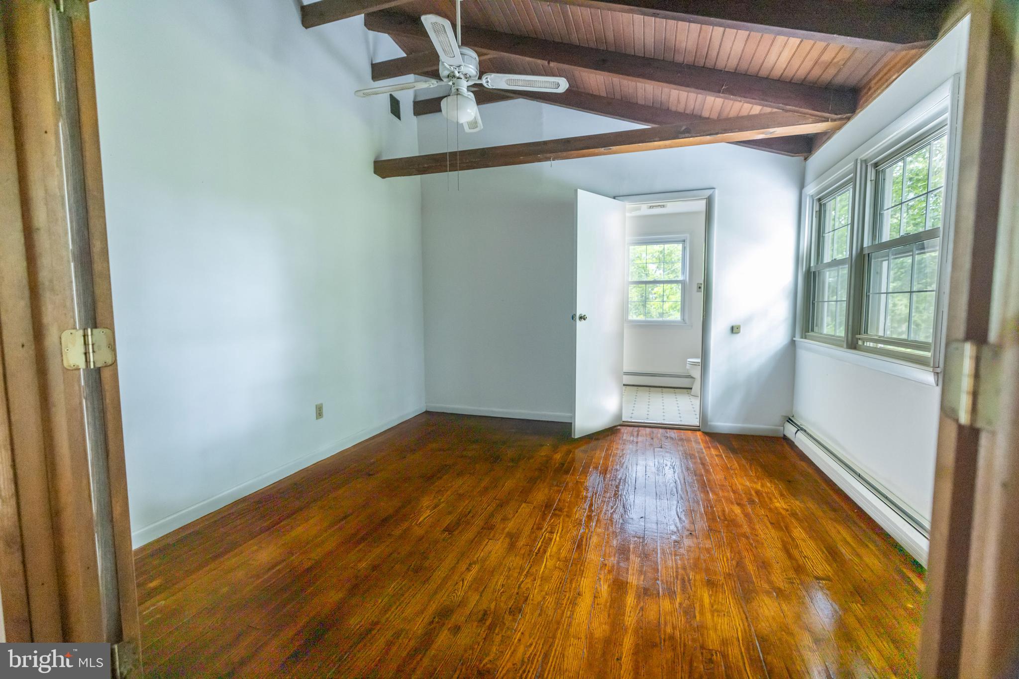 160 Stoney Bank Road Glen Mills, PA 19342 - Photo 22 of 46 a view of room with window and hardwood floor