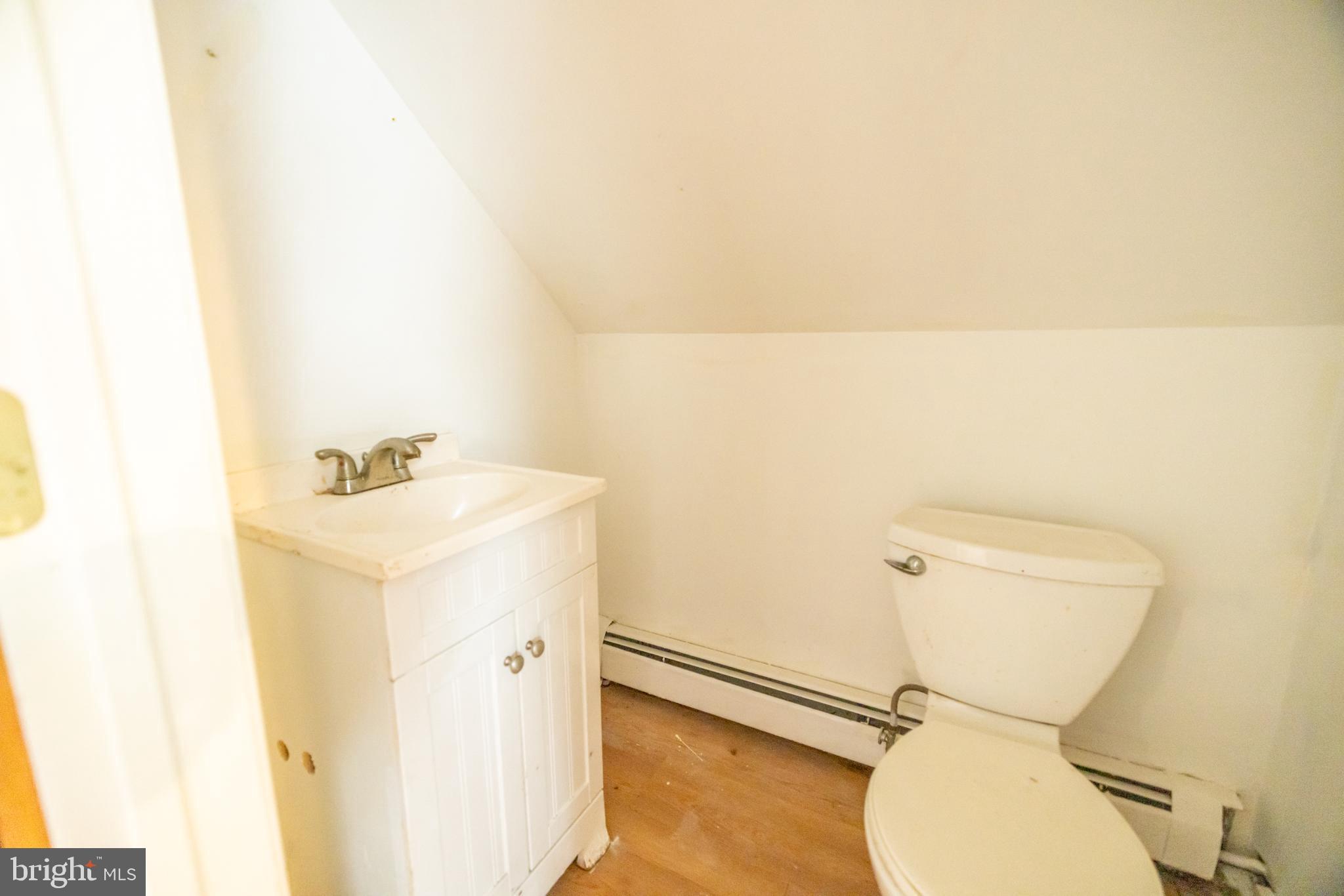 160 Stoney Bank Road Glen Mills, PA 19342 - Photo 26 of 46 a bathroom with a sink a toilet and mirror