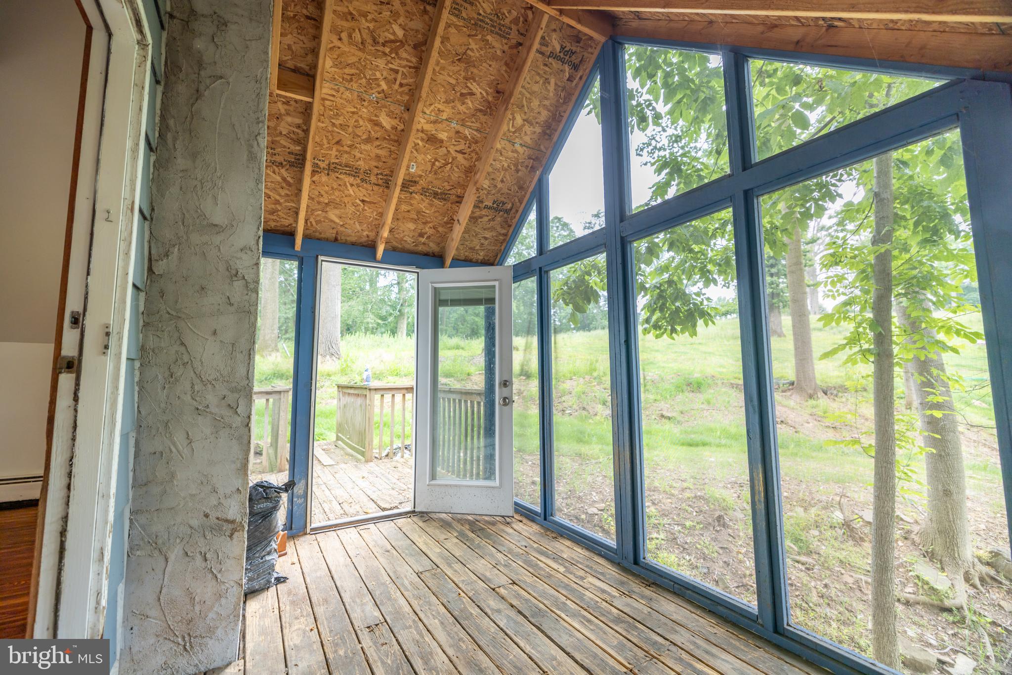 160 Stoney Bank Road Glen Mills, PA 19342 - Photo 27 of 46 a view of an empty room with wooden floor and a window