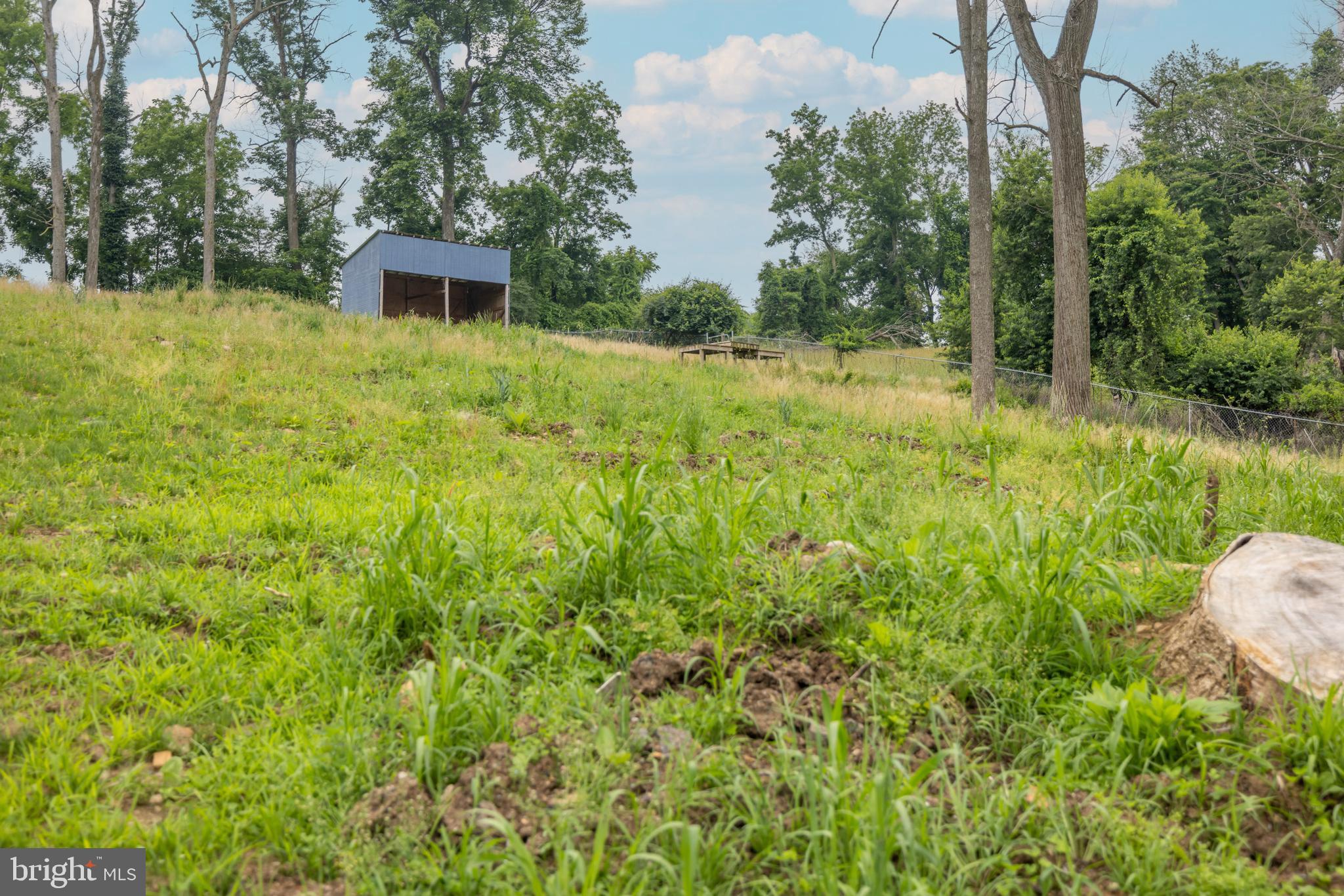 160 Stoney Bank Road Glen Mills, PA 19342 - Photo 38 of 46 a view of a house with a yard