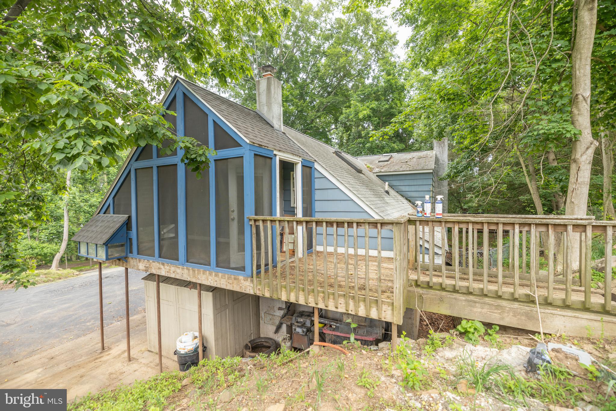 160 Stoney Bank Road Glen Mills, PA 19342 - Photo 10 of 46 a view of a house with a small yard and wooden fence