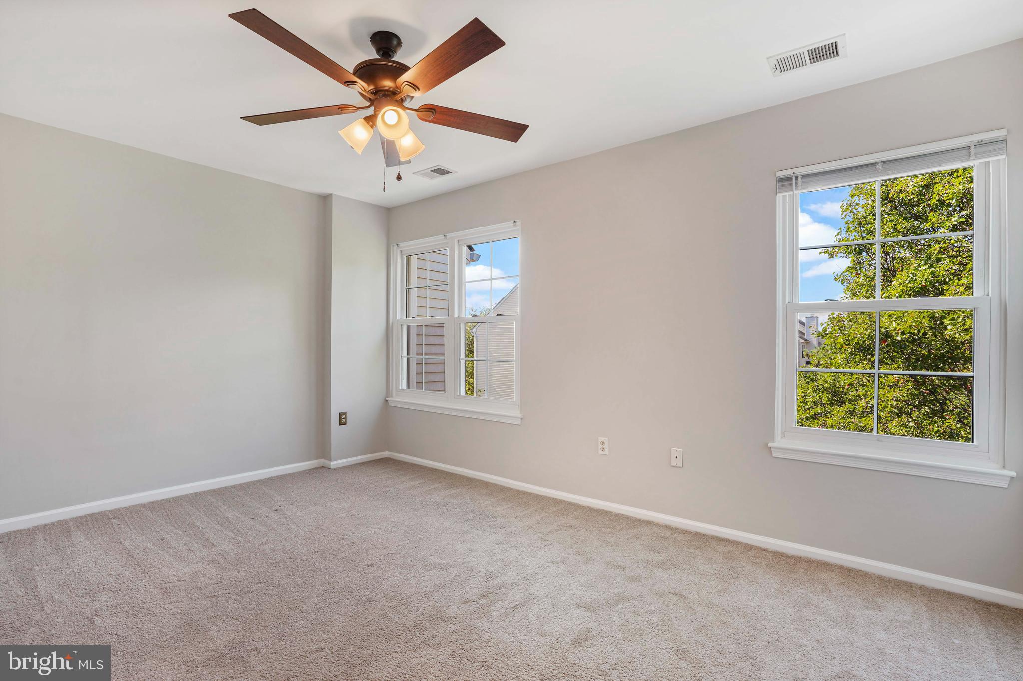 20783 Apollo Terrace Ashburn, VA 20147 - Photo 14 of 33 a view of an empty room with a window