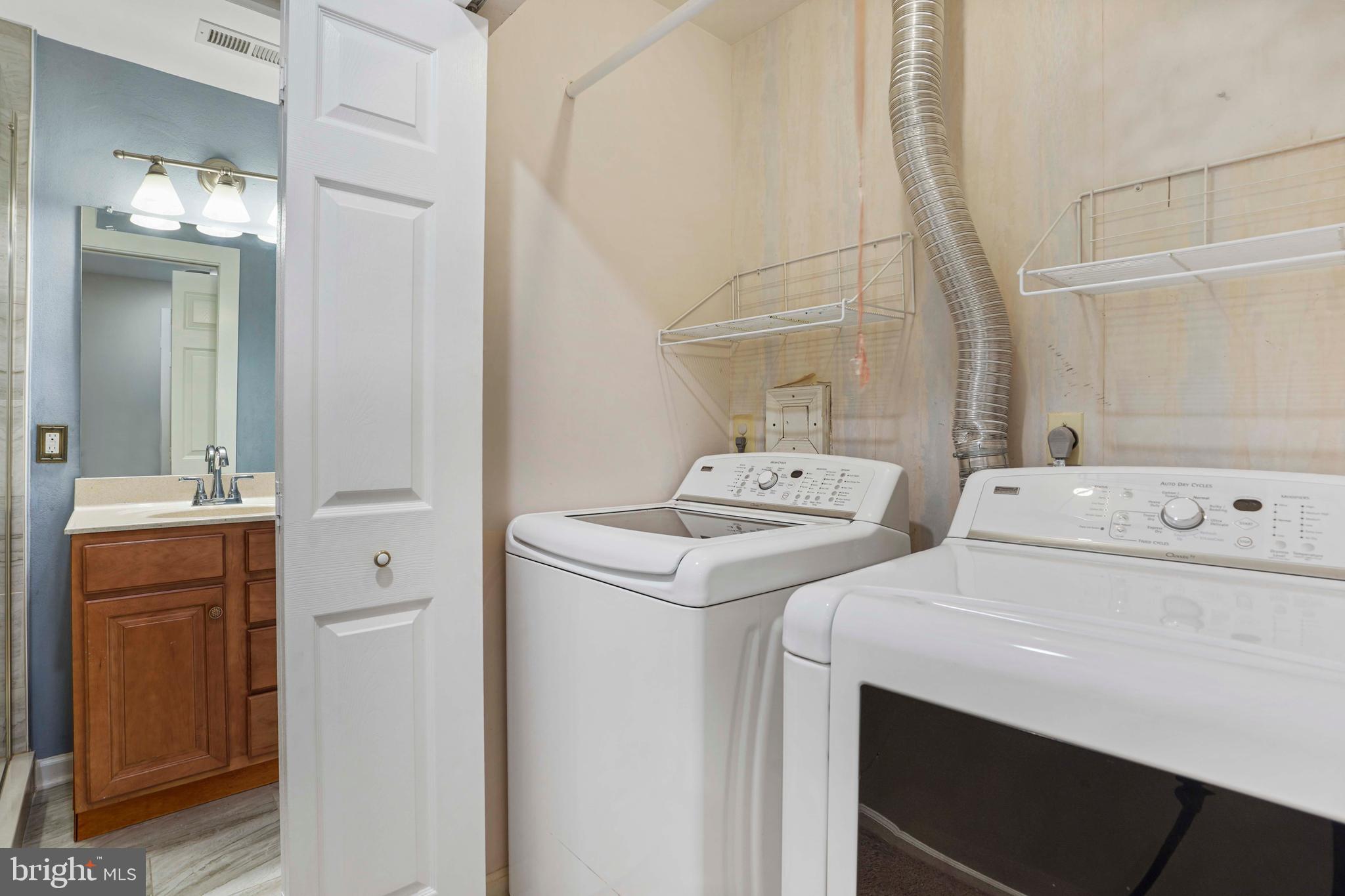 20783 Apollo Terrace Ashburn, VA 20147 - Photo 27 of 33 a utility room with dryer and washer