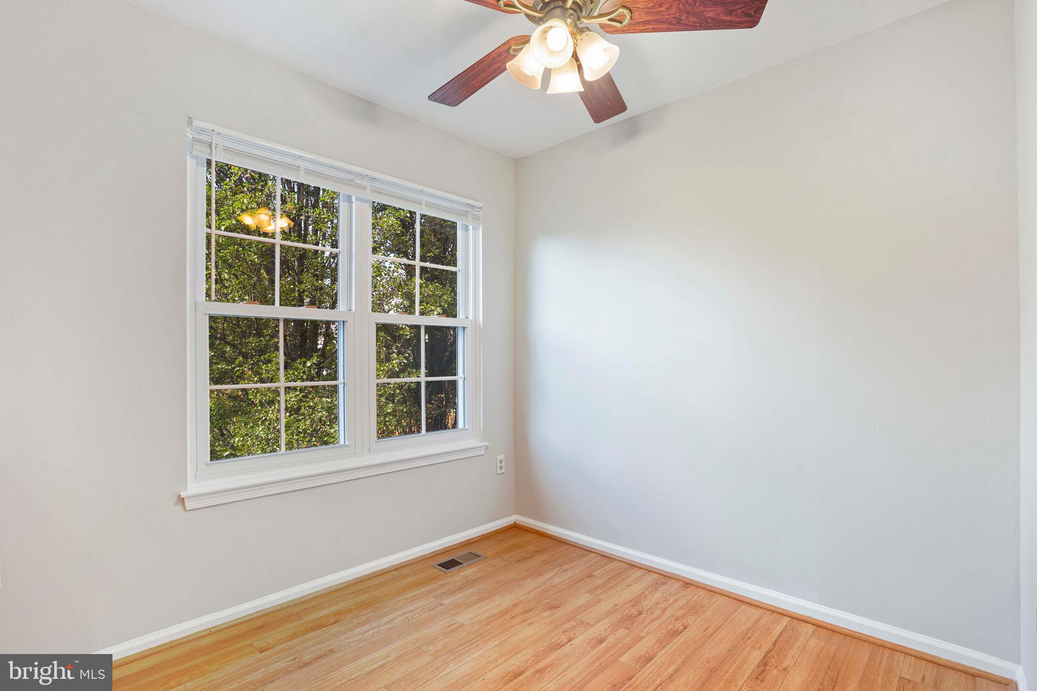 20783 Apollo Terrace Ashburn, VA 20147 - Photo 5 of 33 an empty room with a window