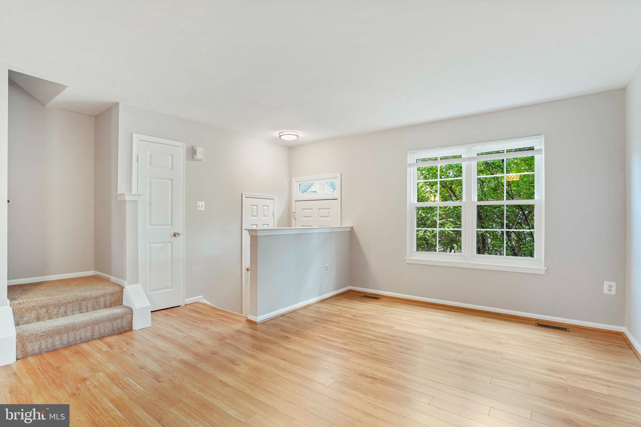 20783 Apollo Terrace Ashburn, VA 20147 - Photo 10 of 33 a view of empty room with wooden floor and fan