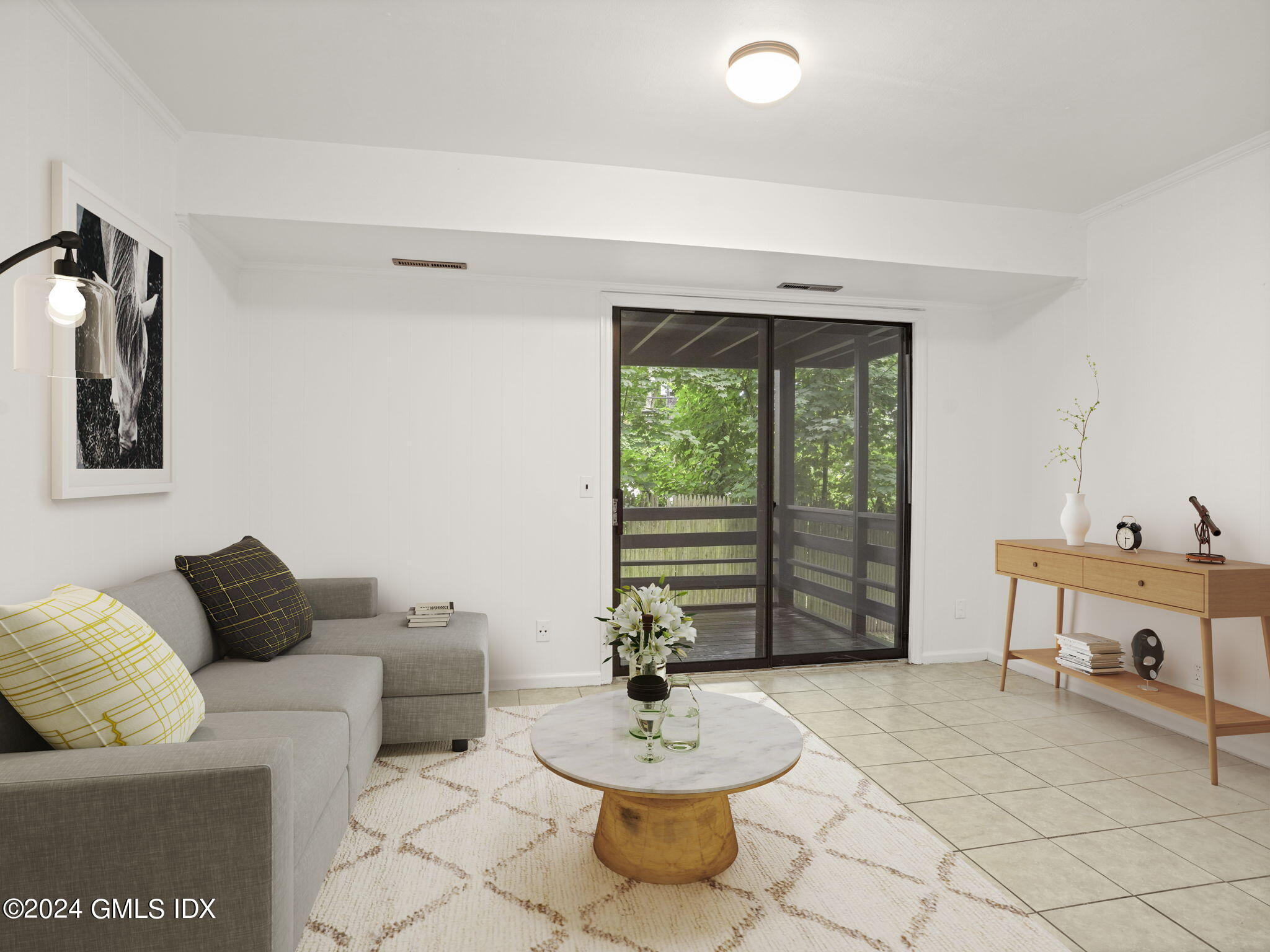 413 Glenbrook Road, Unit 1 Stamford, CT 06906 - Photo 16 of 21 a living room with furniture and a potted plant