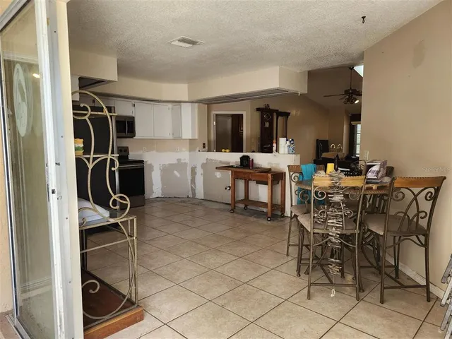 a bathroom with a sink a mirror and a shower