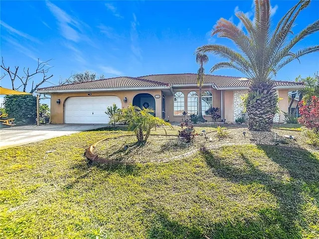 a view of a backyard with a garden