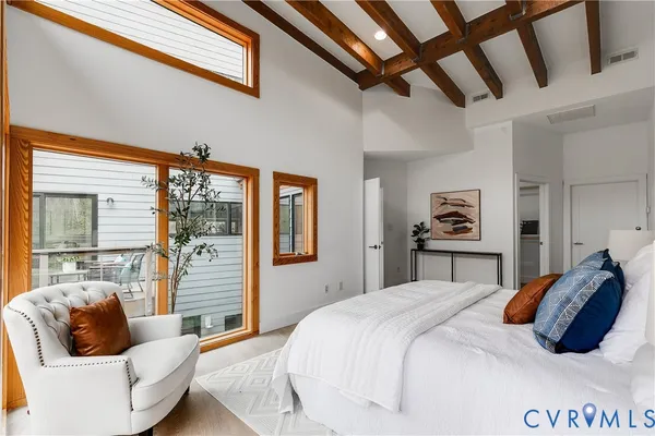 a view of a balcony with wooden floor and outdoor space