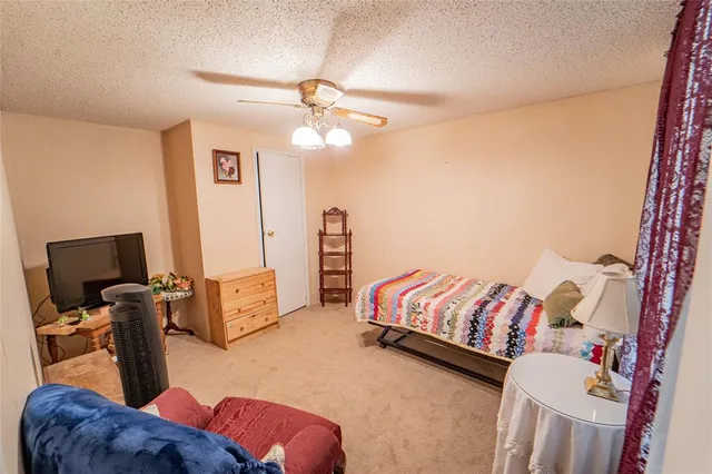 a view of a patio with wooden floor