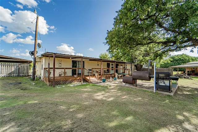 a view of swimming pool with a patio