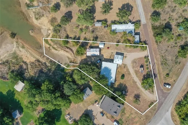 a view of lake with green space