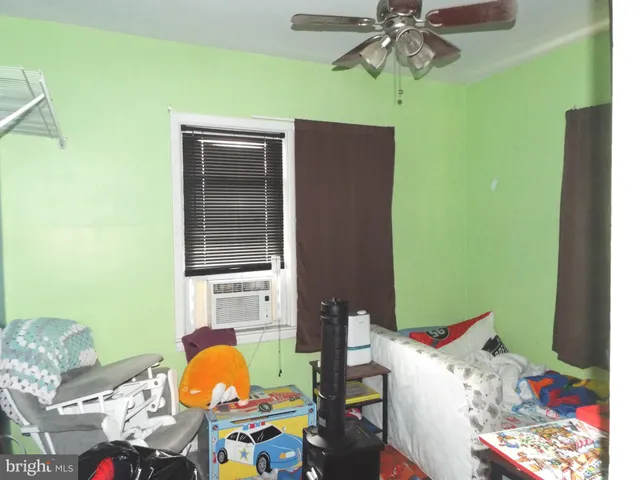 a workspace with furniture and window