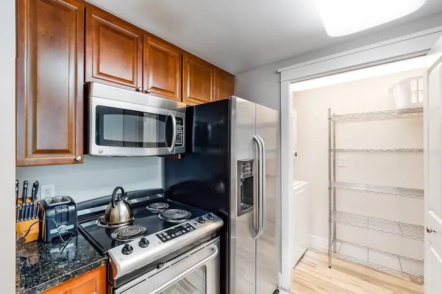 1110 Santa Rosa Boulevard, Unit A413 Fort Walton Beach, FL 32548 - Photo 5 of 90 A413 laundry area/Pantry