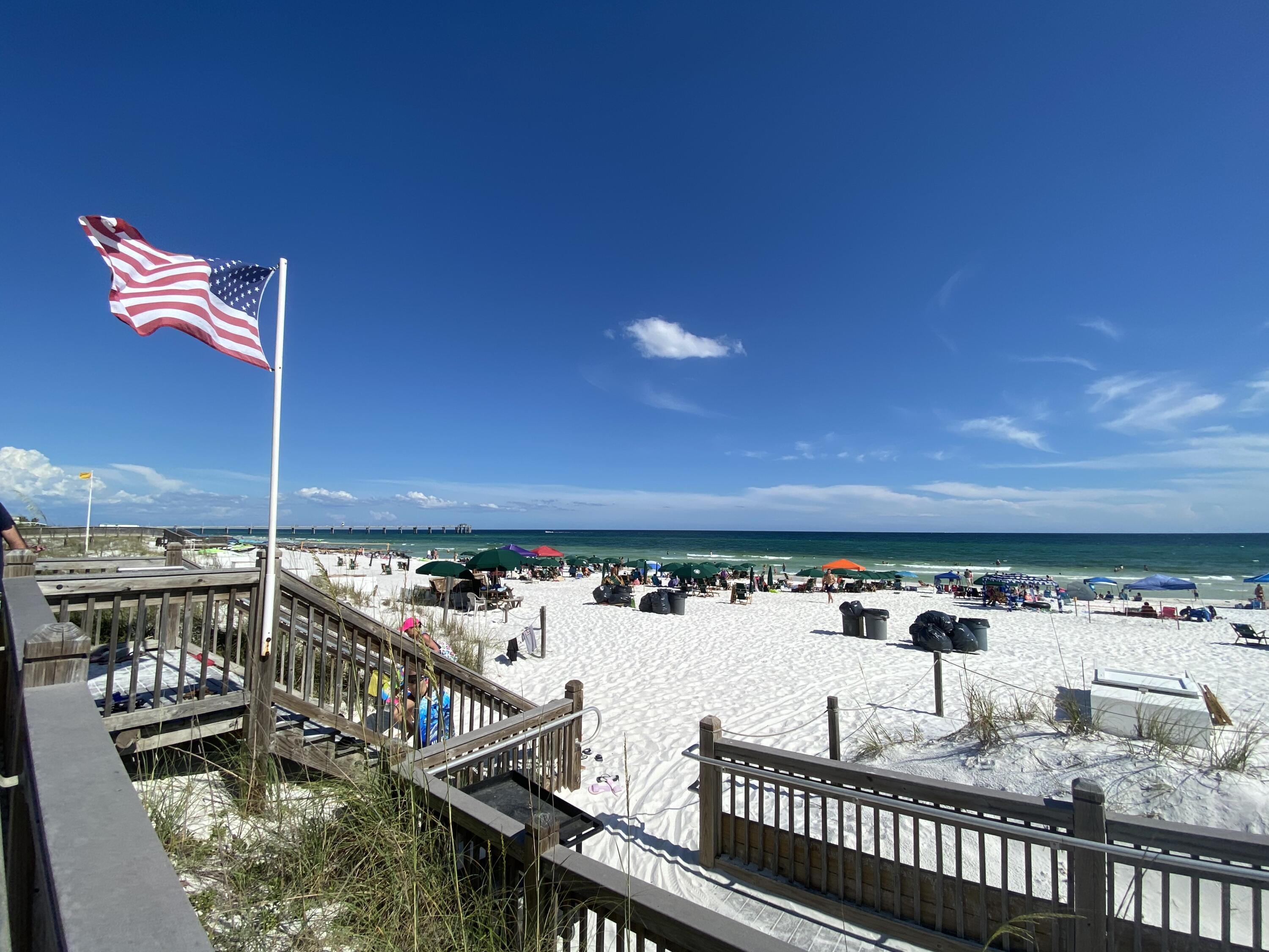 1110 Santa Rosa Boulevard, Unit A413 Fort Walton Beach, FL 32548 - Photo 56 of 90 WSC beach w flag