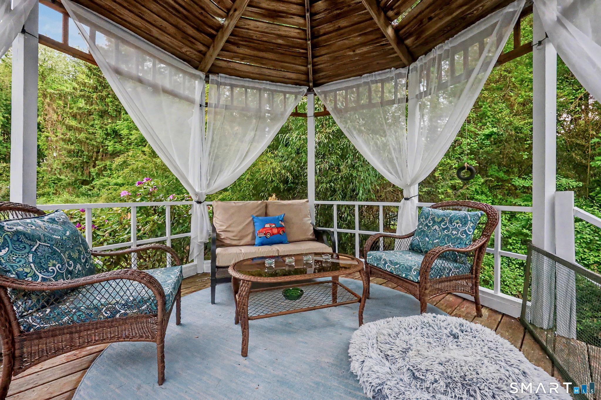 571 Wheeler Road Monroe, CT 06468 - Photo 33 of 40 a outdoor space with the couches and a potted plant