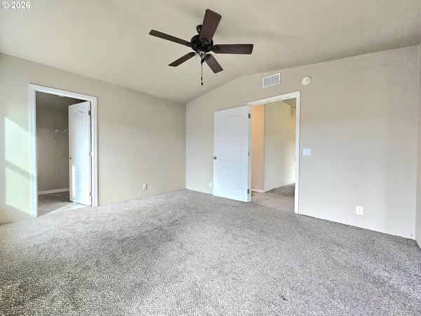 a view of a livingroom with a ceiling fan