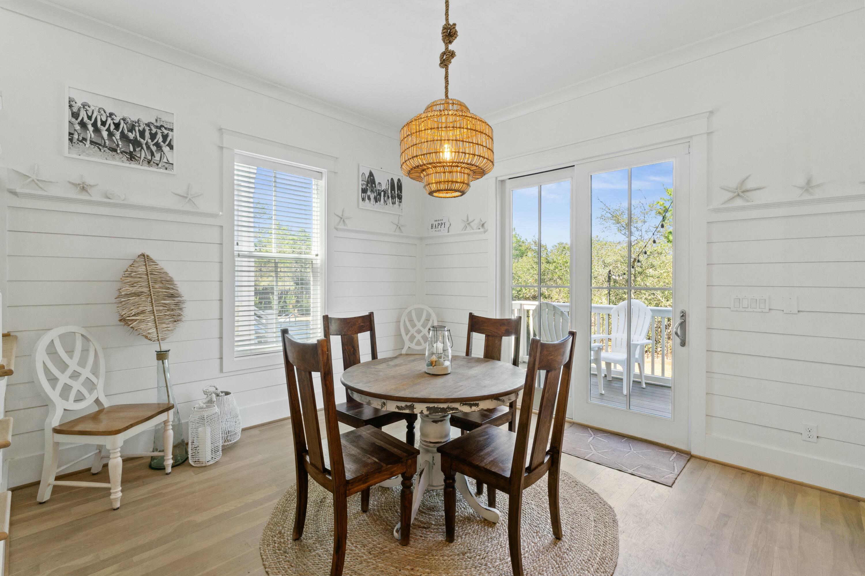 125 Gulfview Circle Santa Rosa Beach, FL 32459 - Photo 14 of 57 a dining room with furniture and window