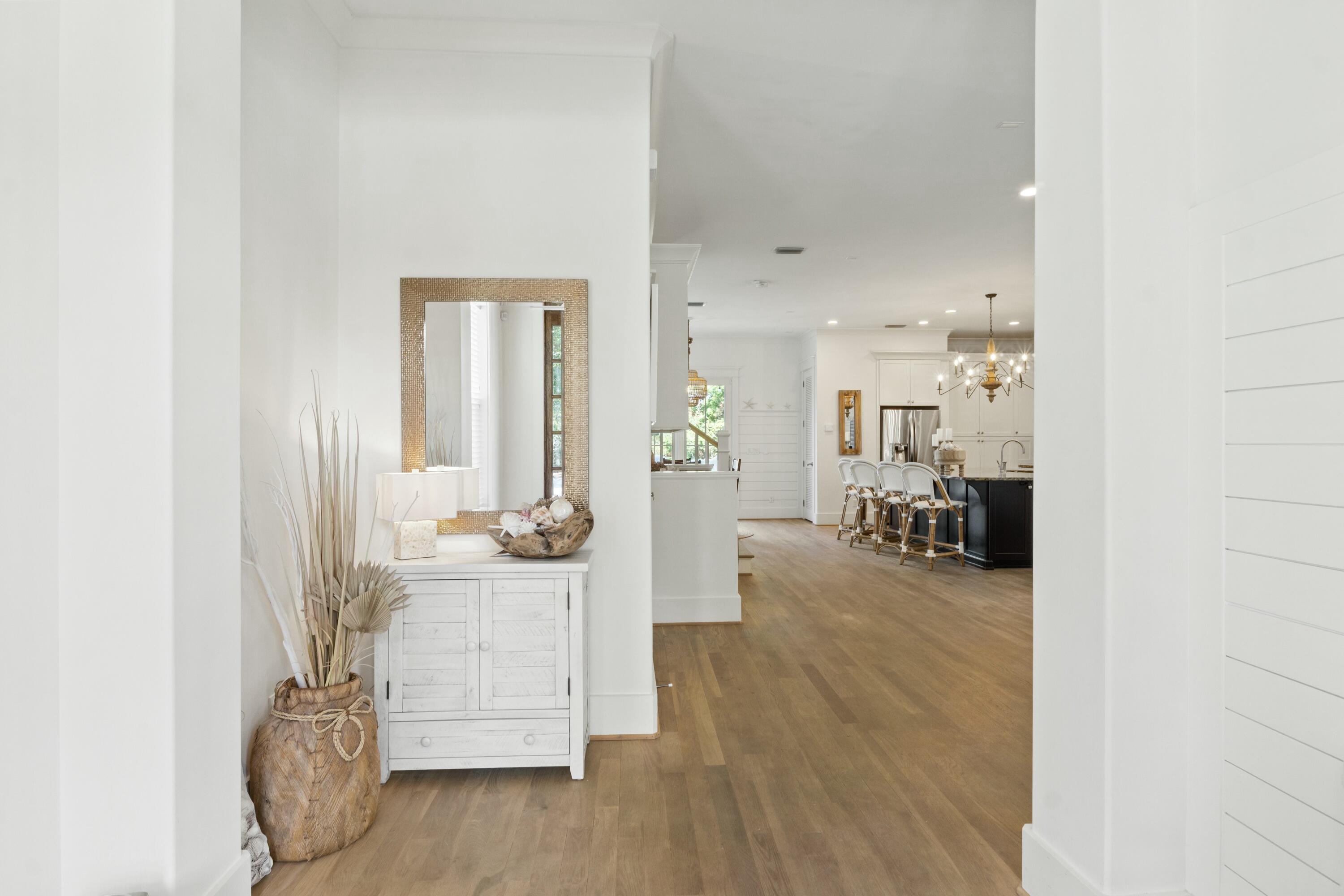 125 Gulfview Circle Santa Rosa Beach, FL 32459 - Photo 17 of 57 a view of a livingroom with furniture and wooden floor