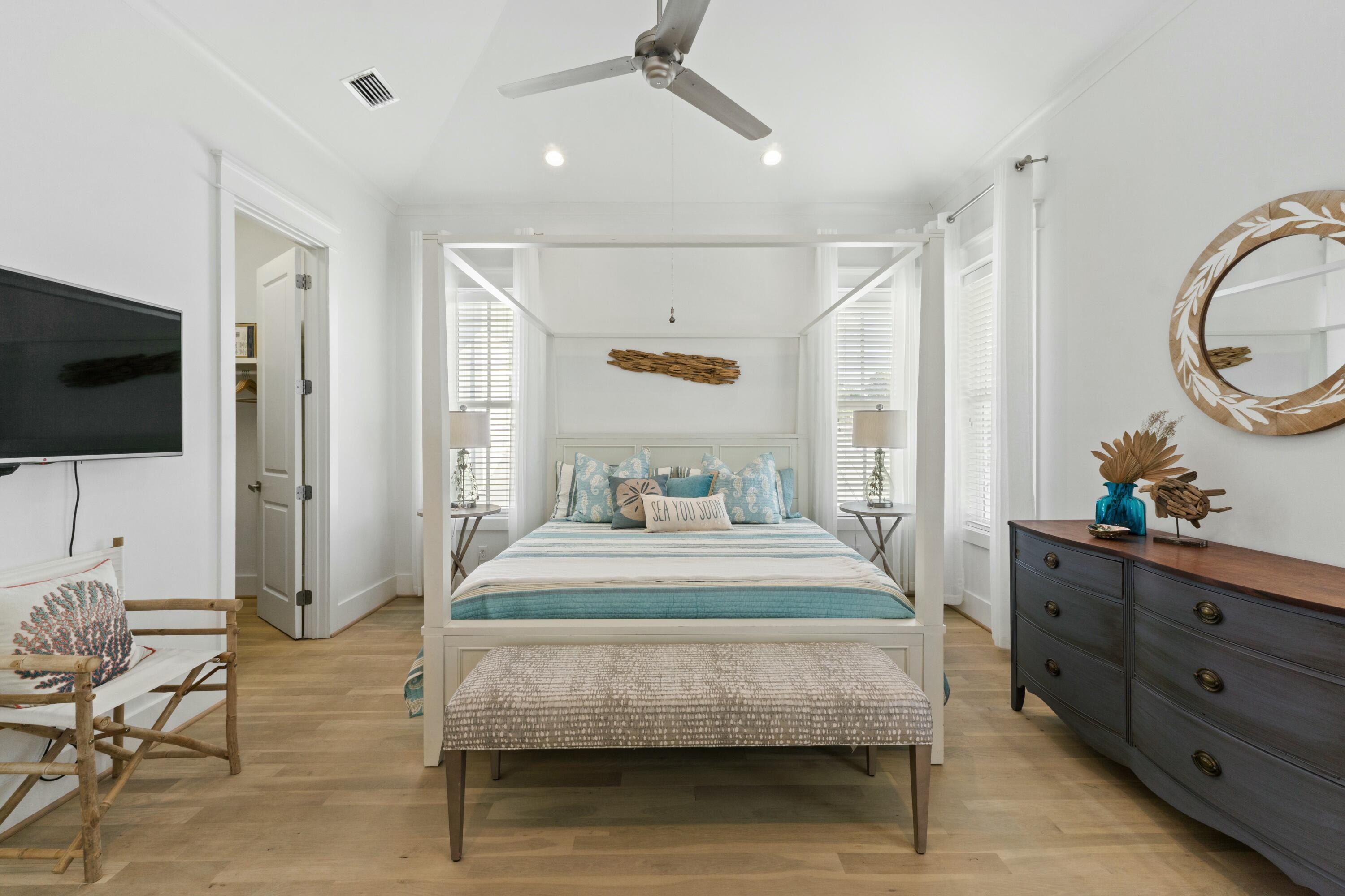 125 Gulfview Circle Santa Rosa Beach, FL 32459 - Photo 21 of 57 a living room with furniture and a flat screen tv