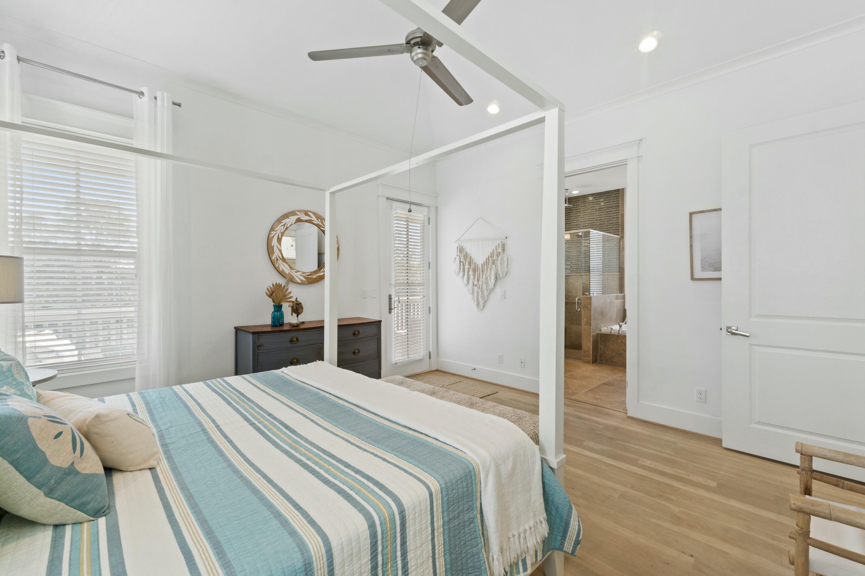 125 Gulfview Circle Santa Rosa Beach, FL 32459 - Photo 24 of 57 a bedroom with a bed and a window