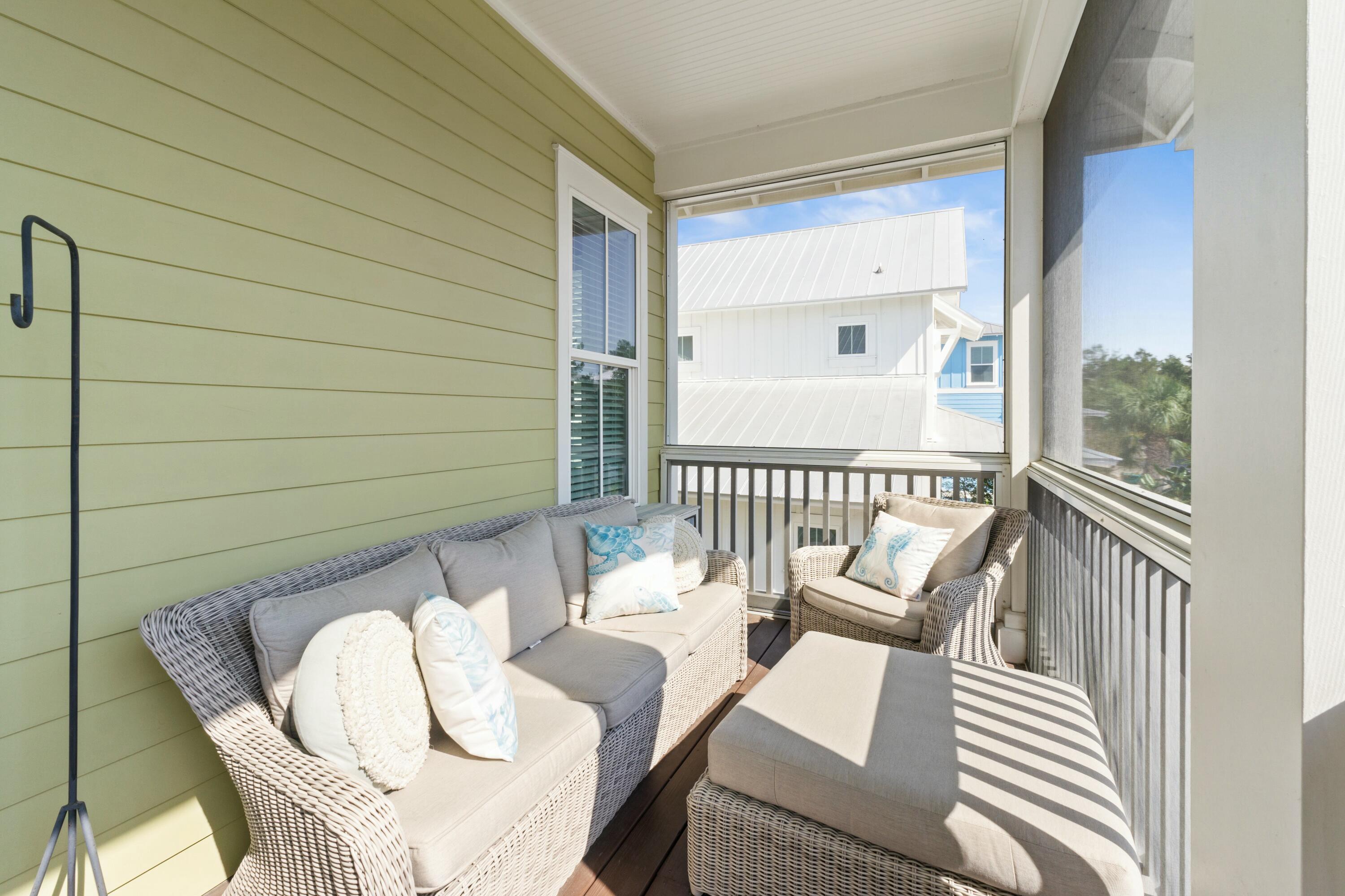 125 Gulfview Circle Santa Rosa Beach, FL 32459 - Photo 28 of 57 a view of a chair and table in the balcony