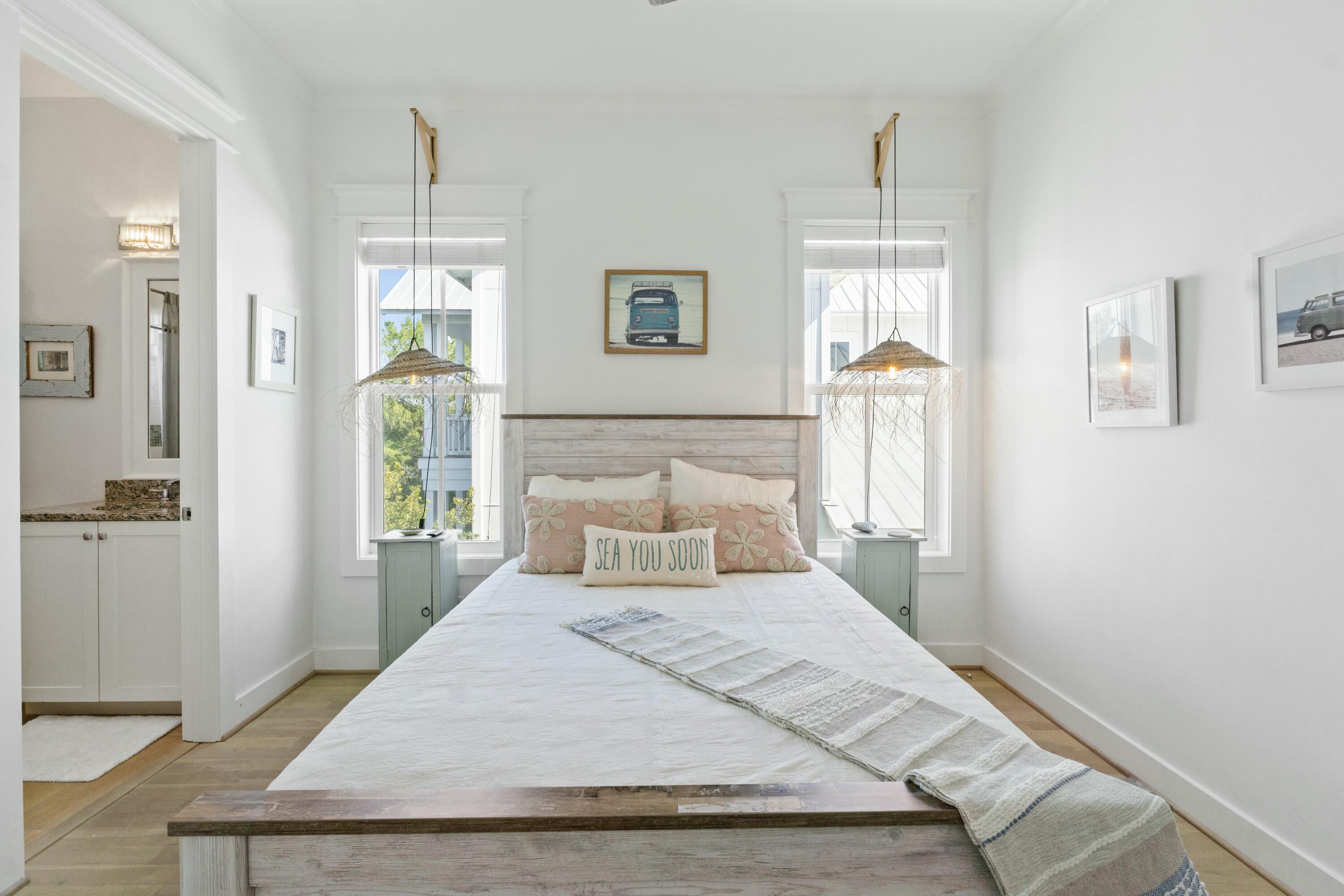 125 Gulfview Circle Santa Rosa Beach, FL 32459 - Photo 34 of 57 a bedroom with a bed and a window