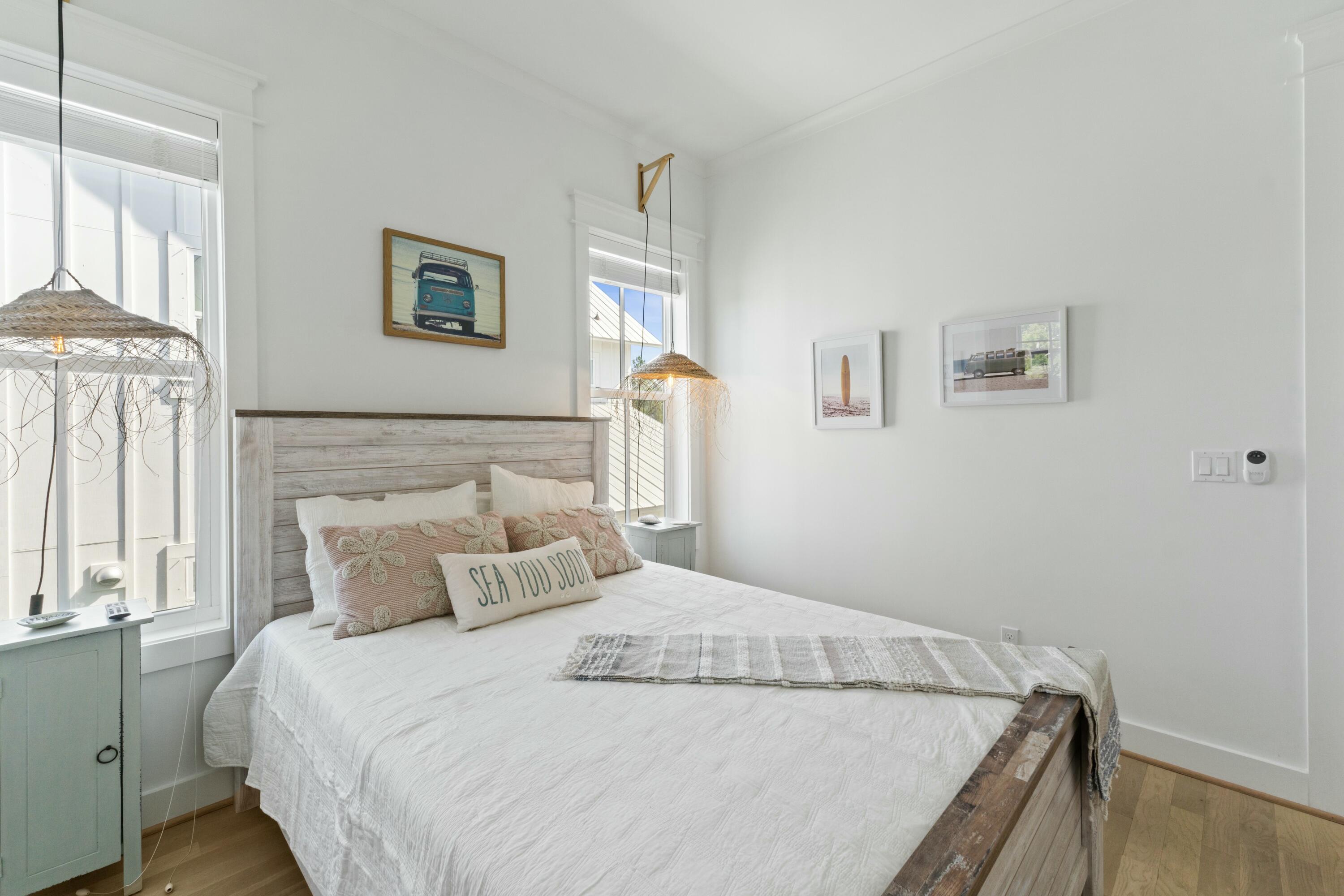 125 Gulfview Circle Santa Rosa Beach, FL 32459 - Photo 35 of 57 a bedroom with a bed and a window