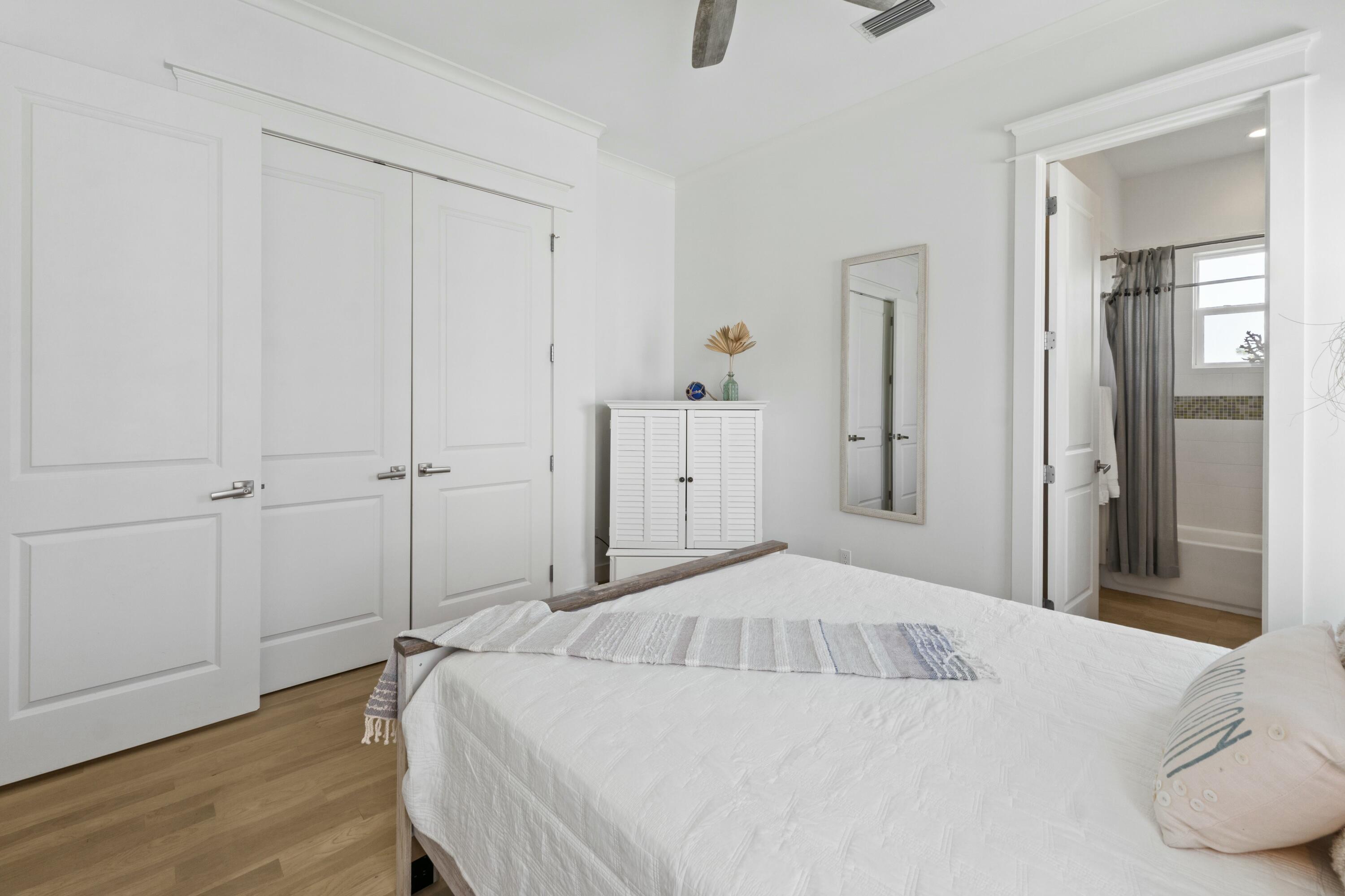 125 Gulfview Circle Santa Rosa Beach, FL 32459 - Photo 37 of 57 a bedroom with a bed and a closet