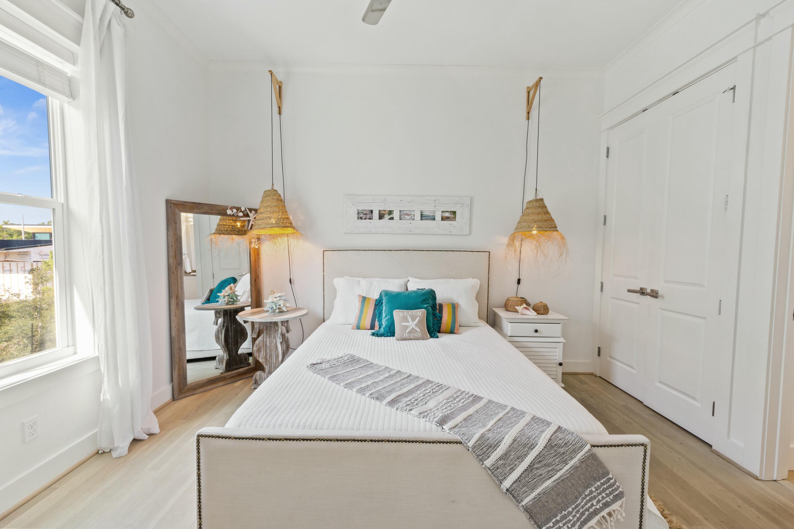 125 Gulfview Circle Santa Rosa Beach, FL 32459 - Photo 40 of 57 a bed room with a bed and a window