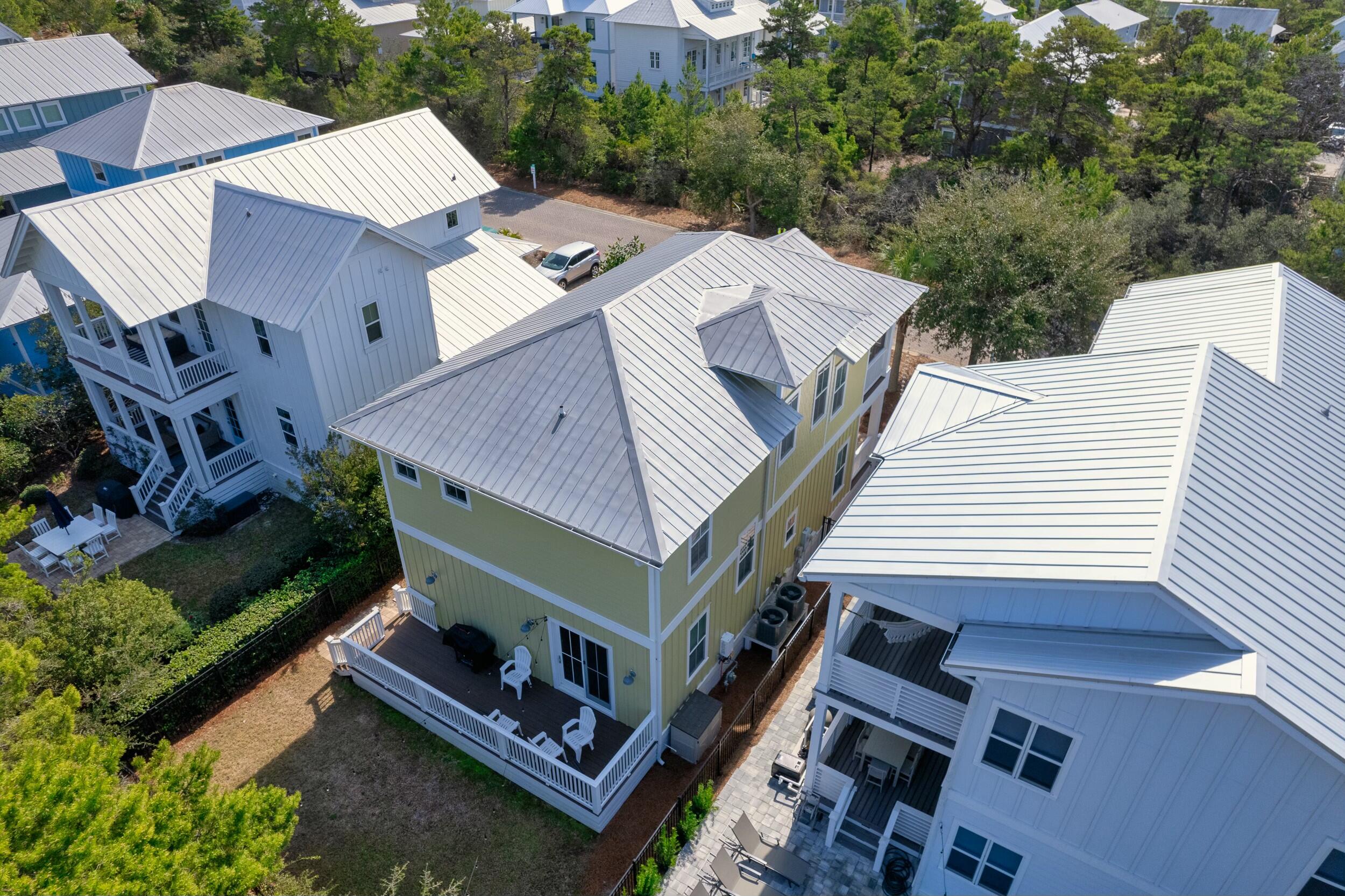125 Gulfview Circle Santa Rosa Beach, FL 32459 - Photo 47 of 57 an aerial view of a house with a yard and balcony
