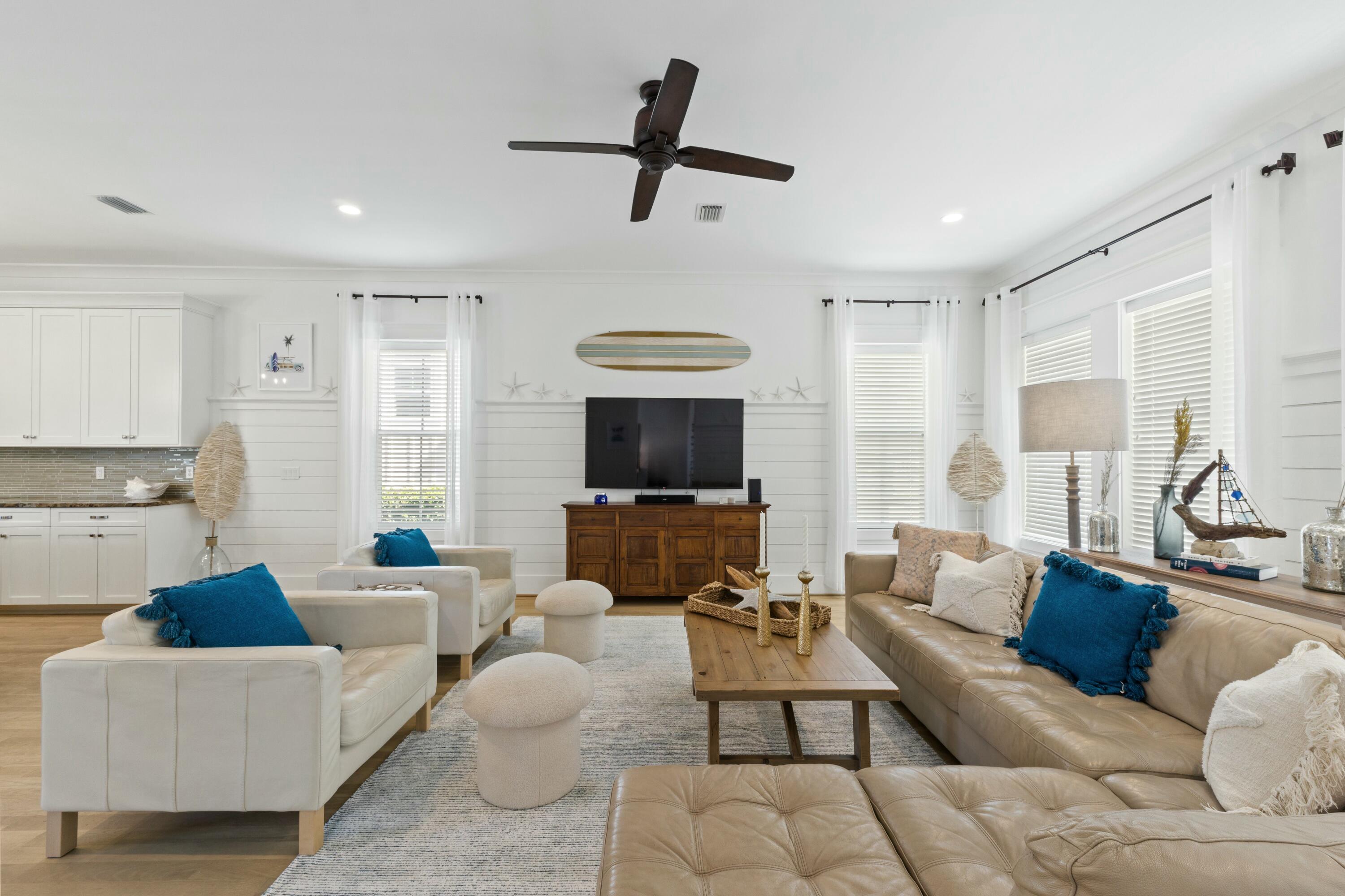 125 Gulfview Circle Santa Rosa Beach, FL 32459 - Photo 5 of 57 a living room with furniture and a flat screen tv
