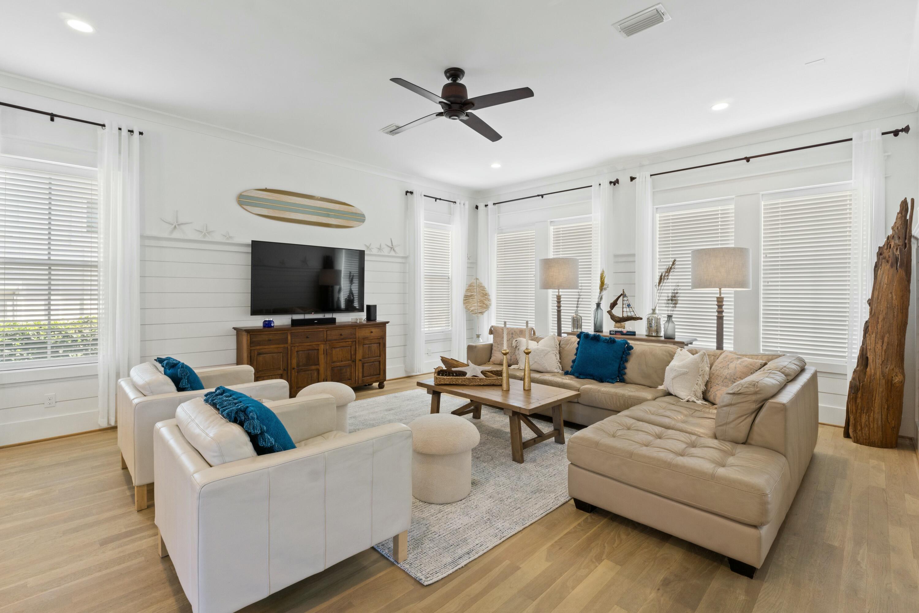 125 Gulfview Circle Santa Rosa Beach, FL 32459 - Photo 8 of 57 a living room with furniture and a flat screen tv