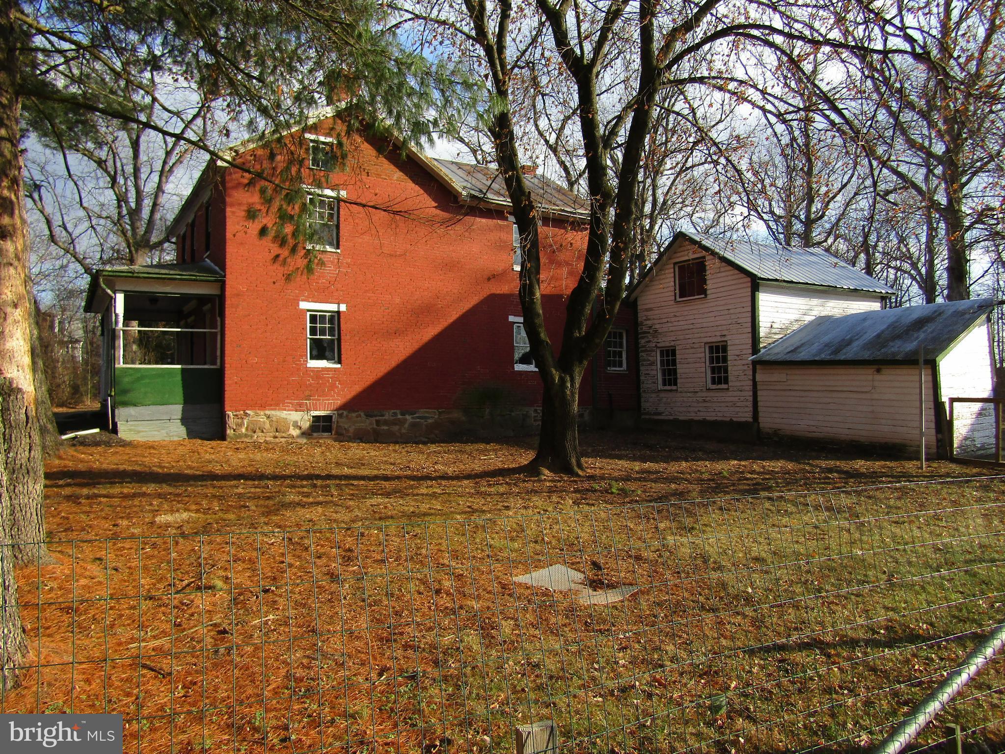6005 Conover Road Taneytown, MD 21787 - Photo 2 of 30 a front view of house with yard