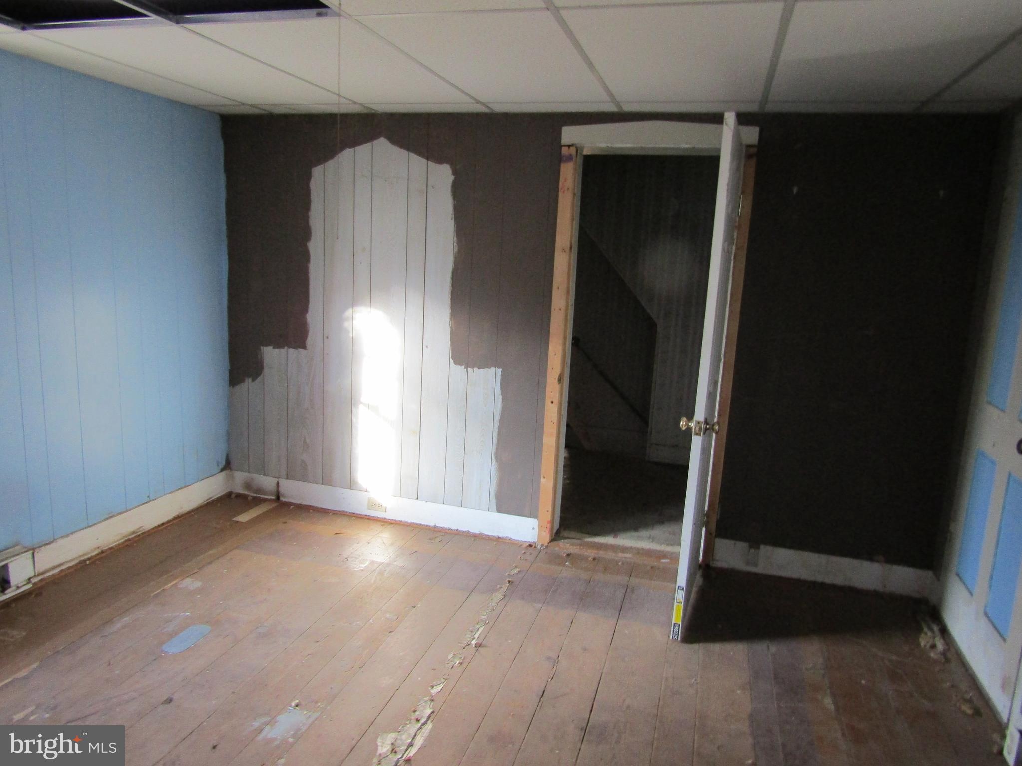 6005 Conover Road Taneytown, MD 21787 - Photo 17 of 30 an empty room with wooden floor