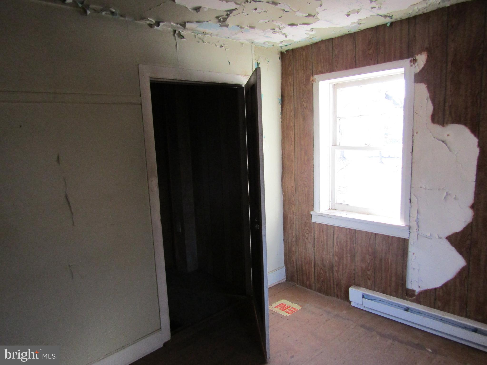 6005 Conover Road Taneytown, MD 21787 - Photo 22 of 30 a view of an empty room with a window